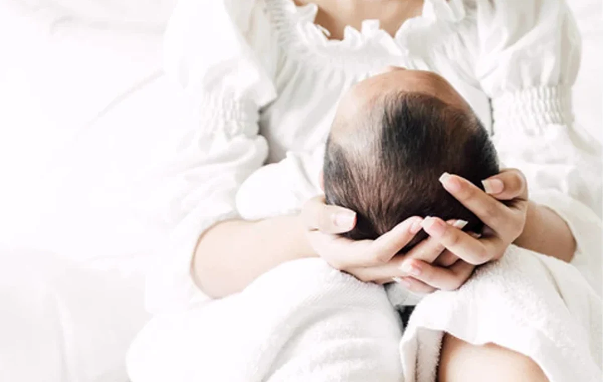 Mother holding a baby